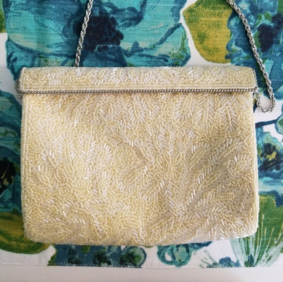 Nina Handbags - 🆕 Nina meadow clutch